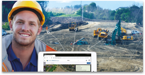 Man posing in front of a worksite