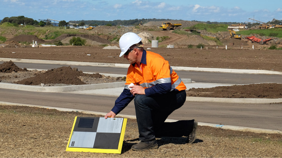 picture of sitech drone services and man setting it up on site